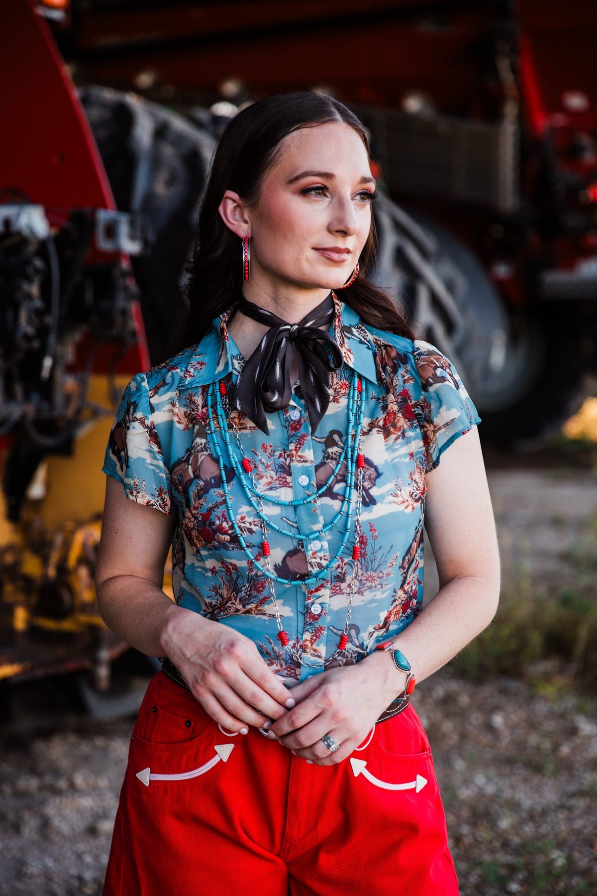 Turquoise Western cowgirl top with floral print and bucking horse design by turquoise haven