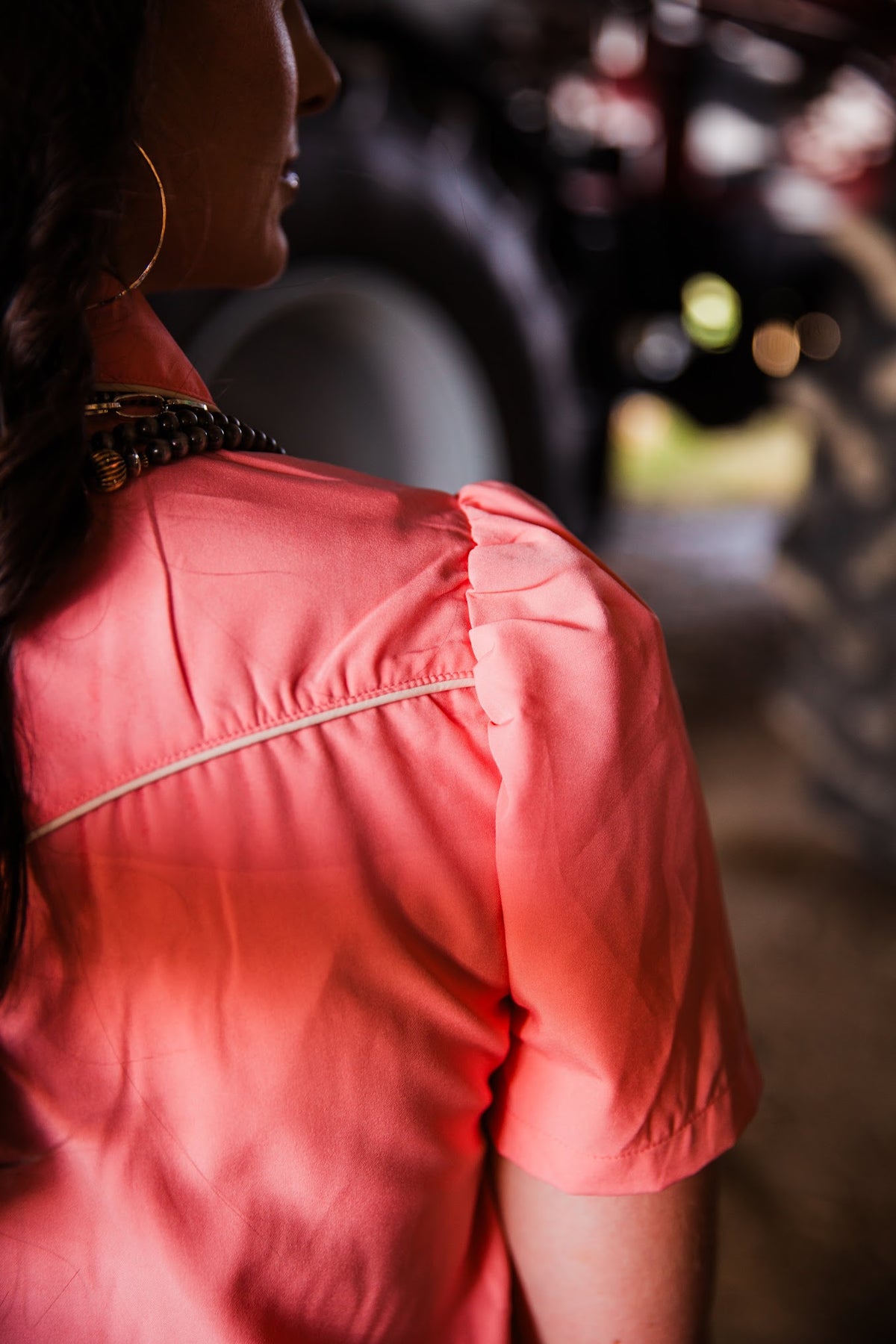women's just peachy pearl snap back of shirt showing ruffle sleeve and cream piping detail by howdy hanny