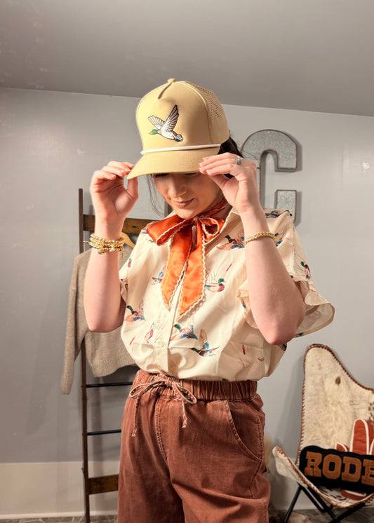 Flying South Trucker in Sand