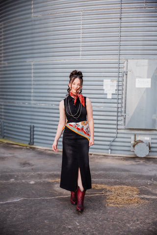 Front view of Sadie in the sleeveless black denim Walk the Line 