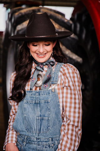 Colton women’s wool cowboy hat styled with Western pearl snap shirt and denim overalls