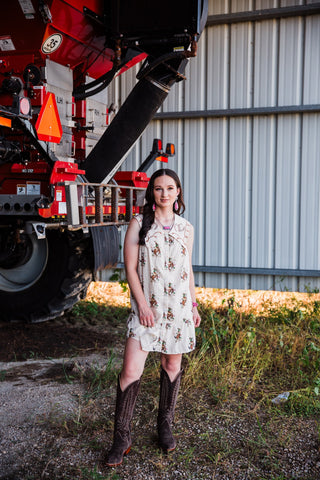 Woman’s cream cowboy print mini dress with embroidered Western collar and tiered hem by howdy hanny