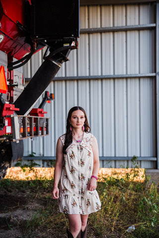 Howdy Hanny Cowboy Embroidery Dress styled with cowboy boots