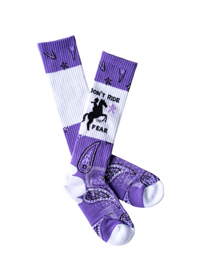 Purple and white socks with a horse design and text on a white background