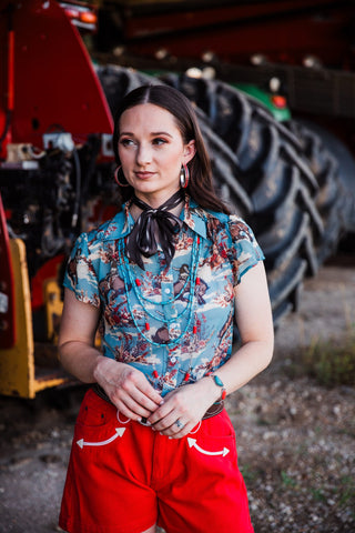 Women’s Western blouse with turquoise floral and bucking horse print by turquoise haven