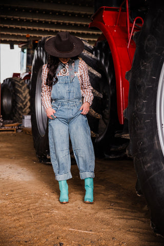 High Plains Denim Overalls styled with Western blouse, cowboy hat and turquoise boots