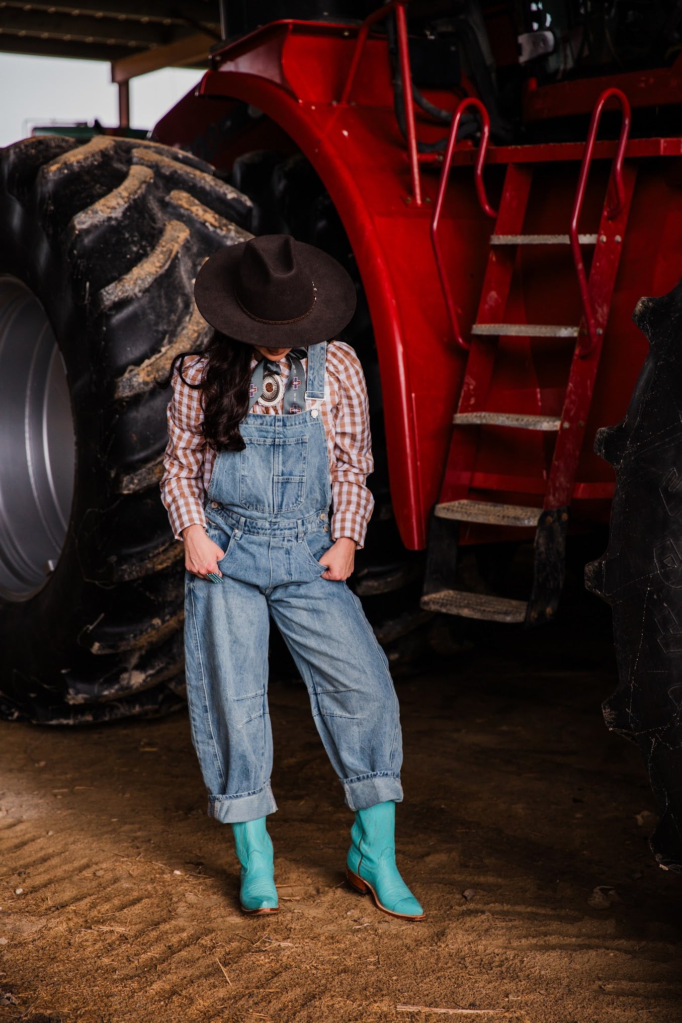Women’s light wash denim overalls with relaxed oversized fit and barrel leg silhouette high plains denim overalls