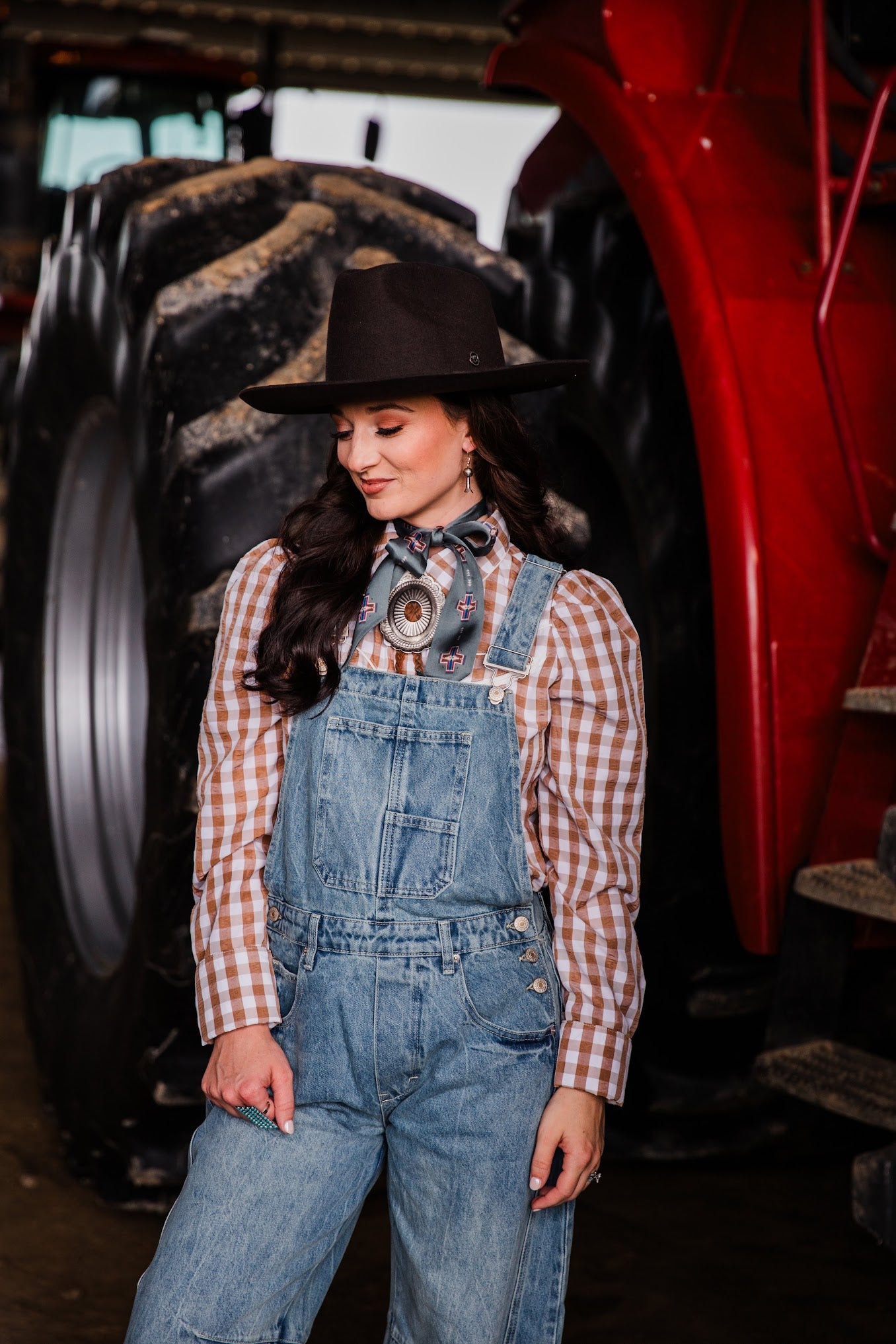 High Plains women’s denim overalls with adjustable straps, bib pocket and light wash finish