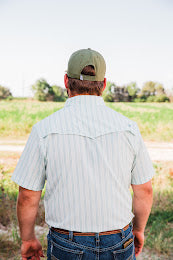 Back view of the Jack in Green short sleeve pearl snap shirt, showing the Western back yoke and fine vertical stripes.