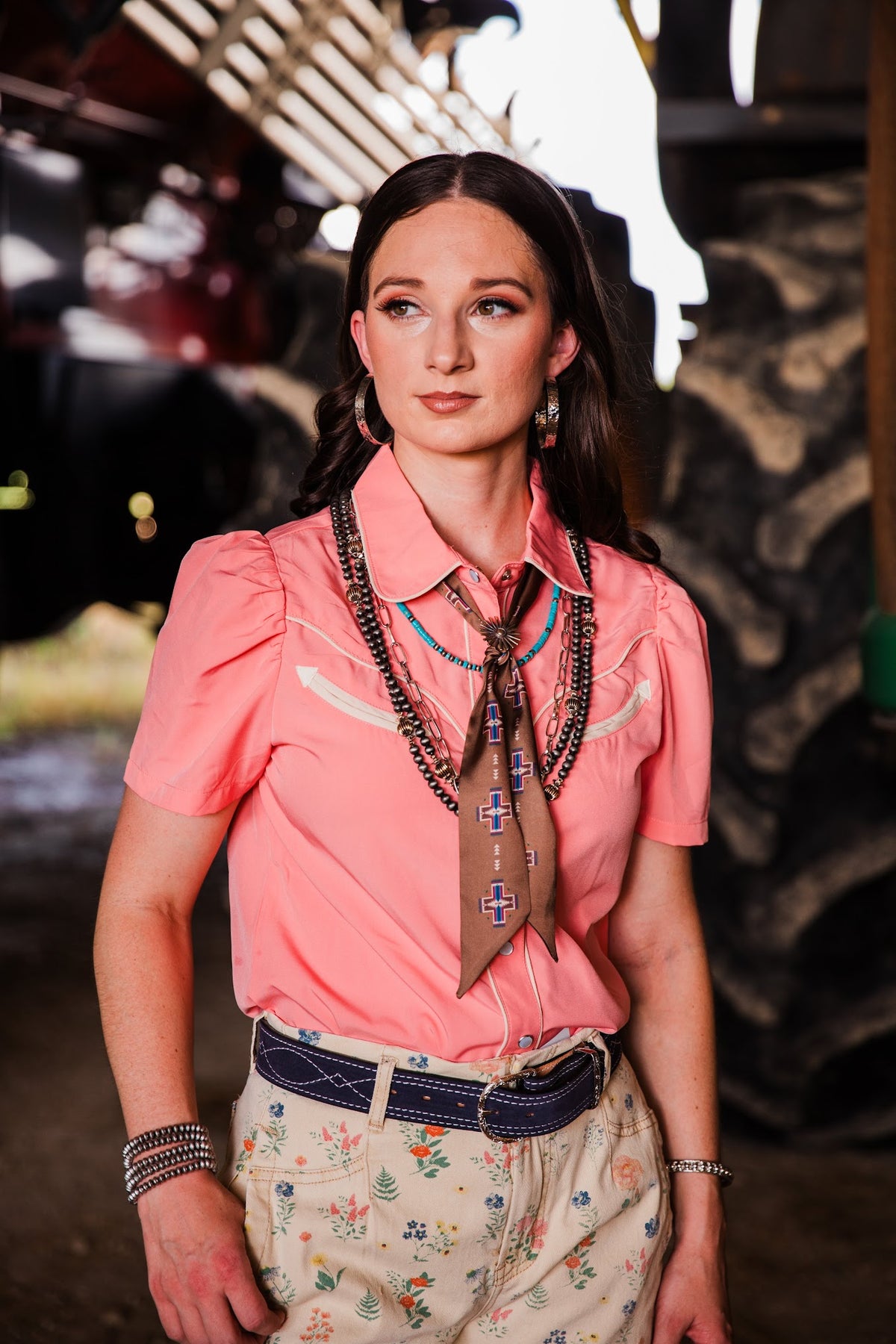 Just Peachy Western pearl snap top for women styled with cowgirl jewelry and printed denim by howdy hanny