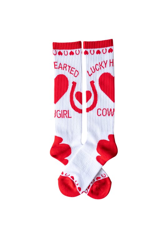 White socks with red hearts and text on a white background