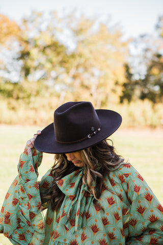 Colton chocolate brown wool Western hat for women styled with denim and brown gingham pearl snap shirt