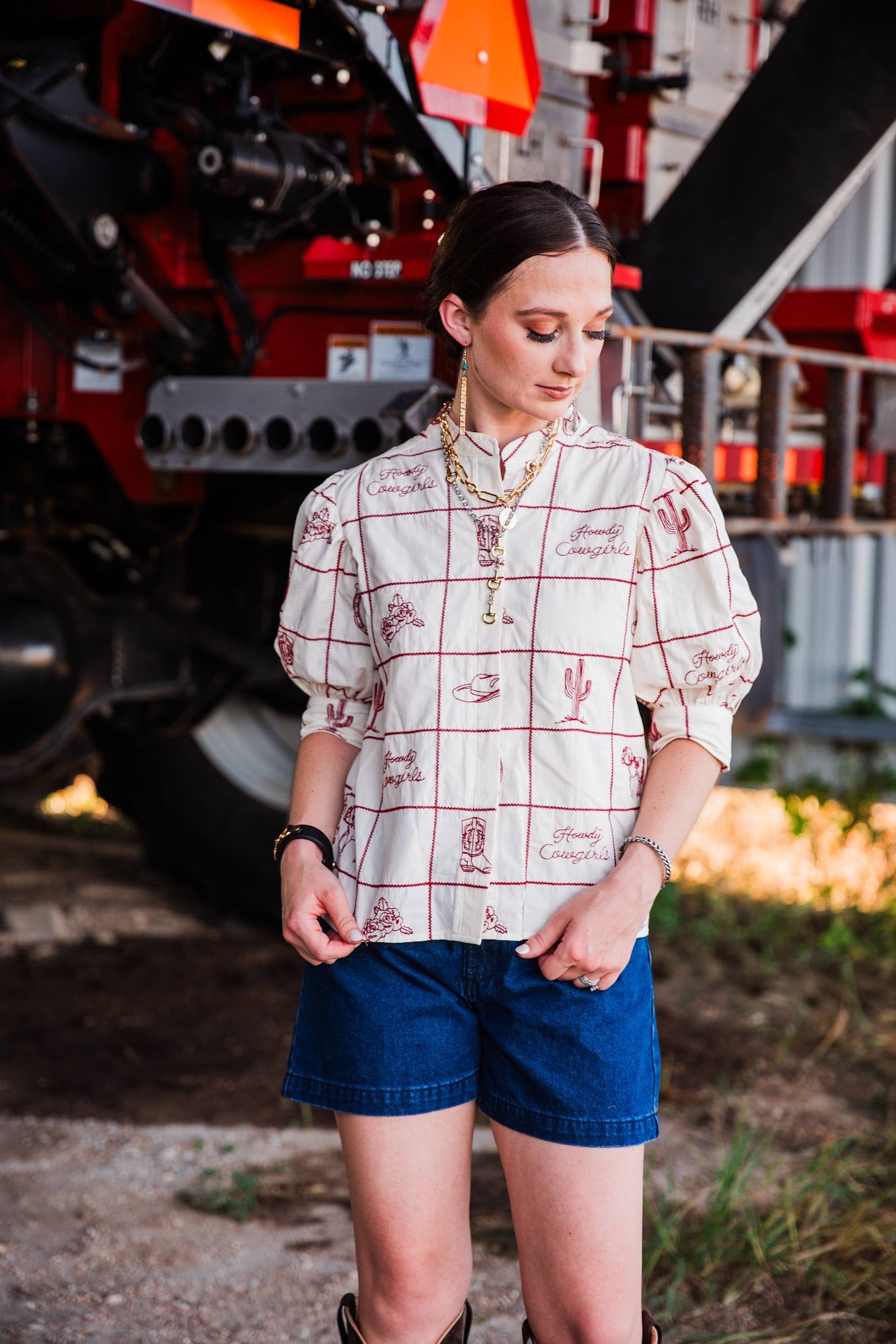 Prairie Post women’s Western top styled with denim shorts and cowboy boots