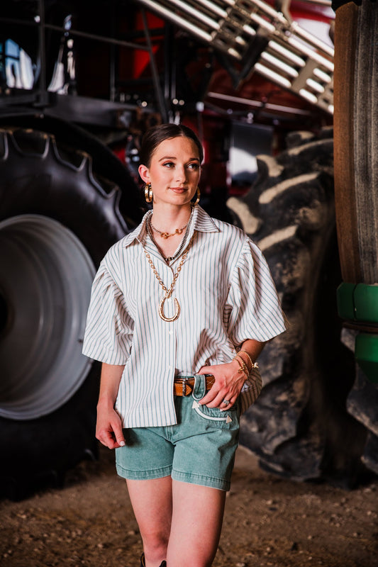 The Outlaw Seersucker Top women’s striped Western button-down shirt styled with denim shorts