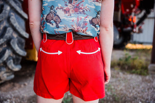 Back view of Polly Red Shorts by Howdy Hanny with contrast pocket details