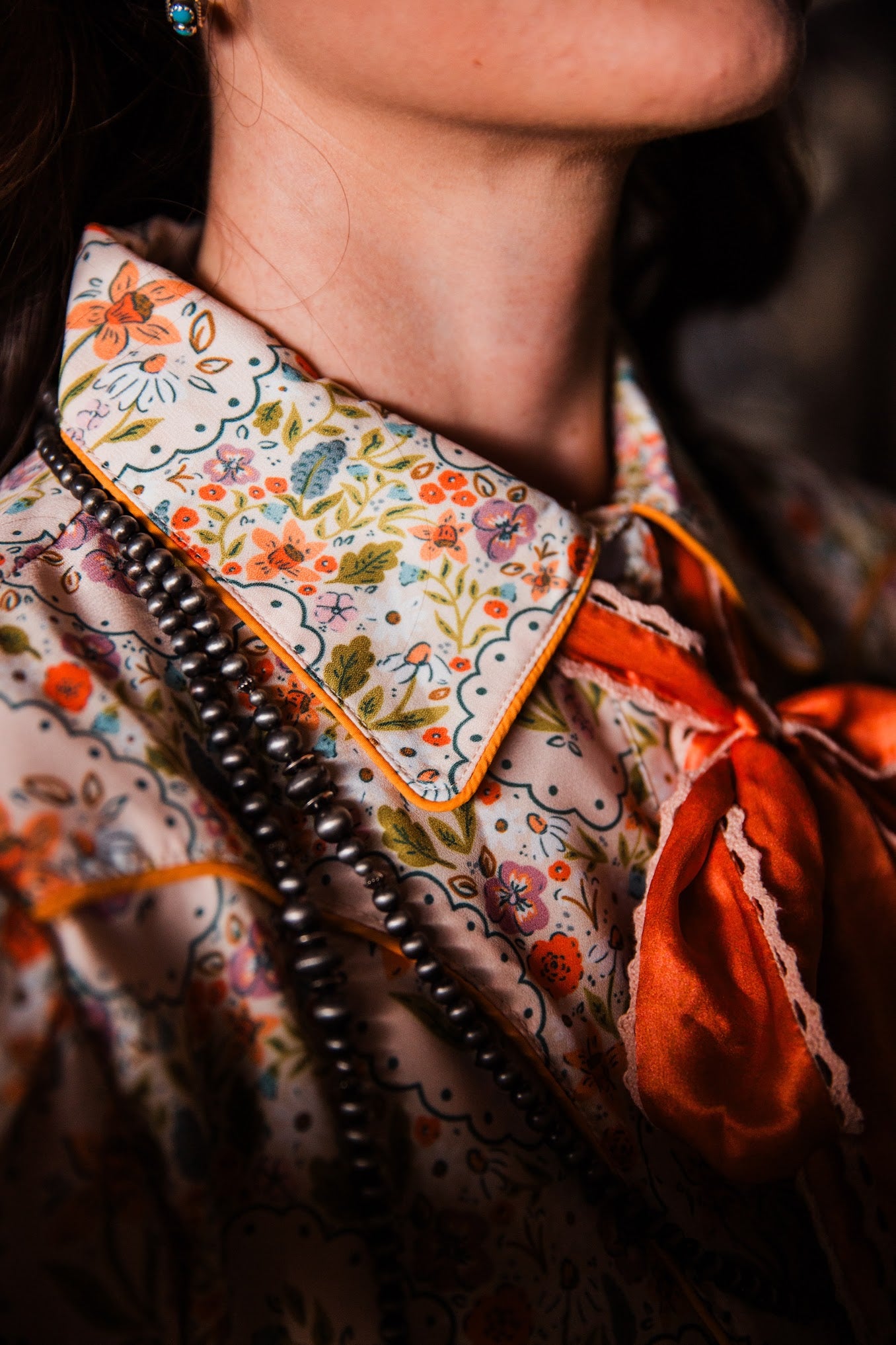 Close-up of Sadie Mae Western floral dress showing statement collar, piping and floral print