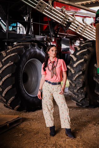 Sweet Magnolia women’s floral barrel jeans in cream denim styled with pink Western pearl snap shirt