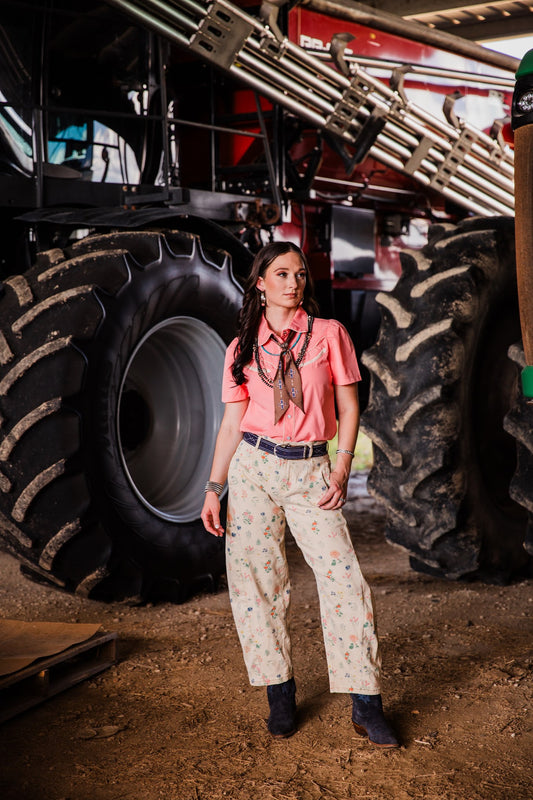 Sweet Magnolia women’s floral barrel jeans in cream denim styled with pink Western pearl snap shirt