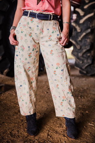 Women’s cream floral barrel leg jeans with multicolor wildflower print and relaxed fit