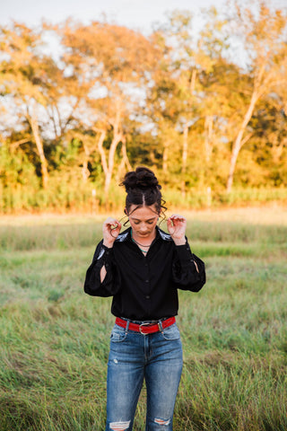 Turquoise Haven Midnight Rider Horse Embroidered Blouse in black, front view with white collar embroidery and long sleeves.