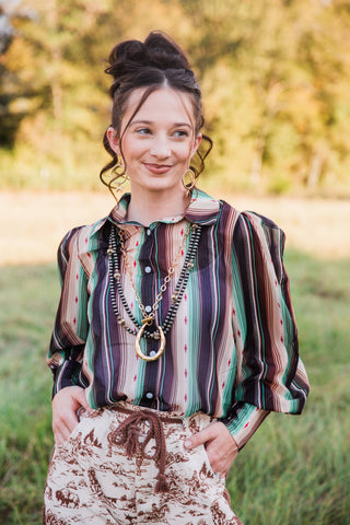 Sagebrush Trails Serape Blouse by Turquoise Haven, front detail showing green serape stripes, collar and button front.