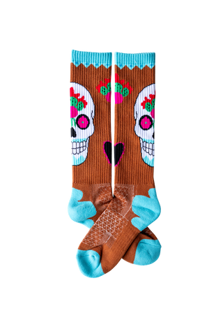Colorful socks with skull designs on a white background